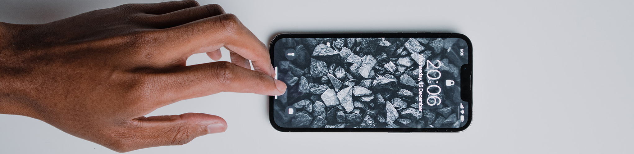 Hand reaching towards a cellphone Hand reaching towards phone, photo by Nubelson Fernandes on UnSplash
